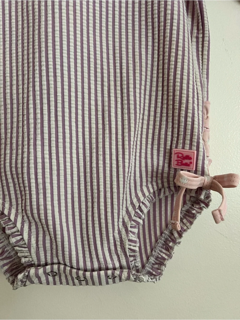 Ruffle Butts purple striped swimsuit